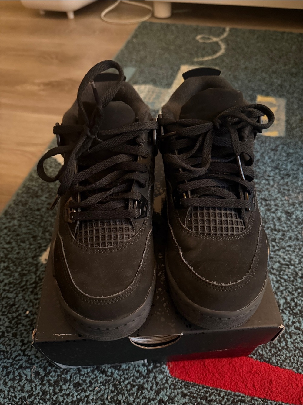 Jordan 4’s All-Black Retro Sneakers